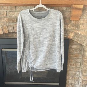 Sweater from Reebok. It’s a very light sweater.